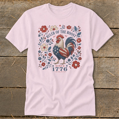 Pink t-shirt with patriotic rooster design and text "Ruler of the Roost Since 1776".