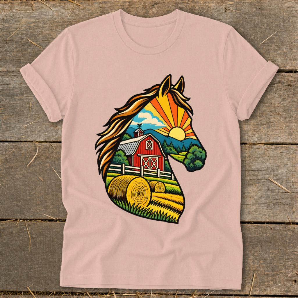 Dusty pink short-sleeve t-shirt featuring a graphic of a horse's head filled with a farm scene.