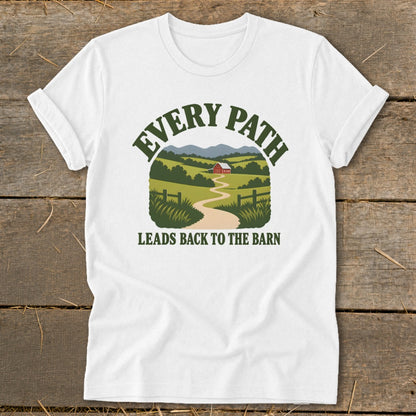 White t-shirt with "Every Path Leads Back To The Barn" text and barn graphic.