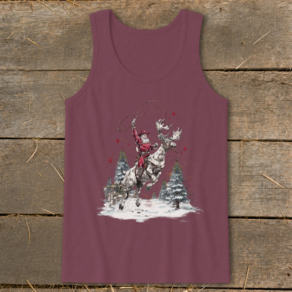 Santa lassoing a reindeer with snow-covered trees and a fence in the background.