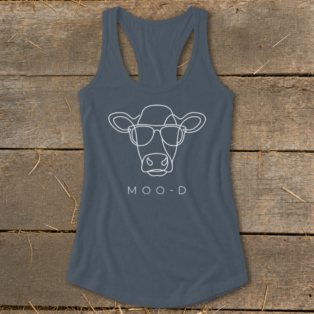 Slate blue tank top with a white line drawing of a cow wearing sunglasses and "MOO-D" text.