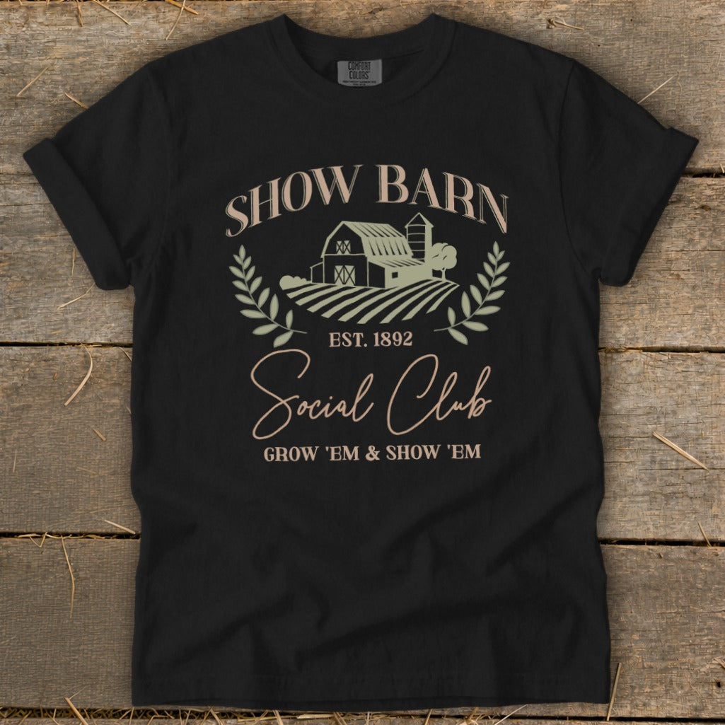 Black t-shirt with "Show Barn Social Club" and farm graphics.