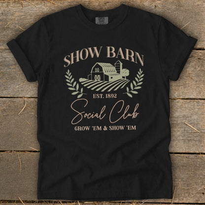 Black t-shirt with "Show Barn Social Club" and farm graphics.