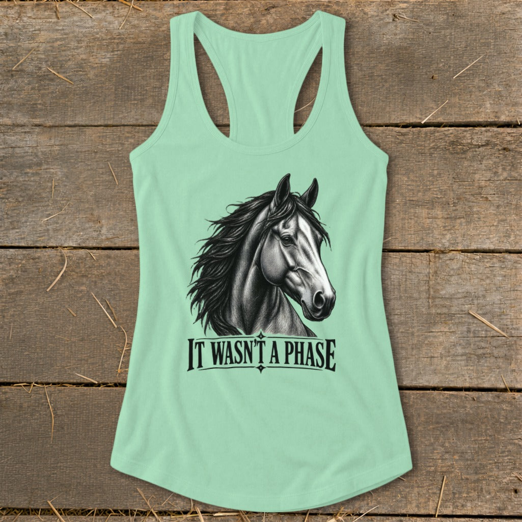 Mint green tank top with a sketch of a horse and text "IT WASN'T A PHASE".