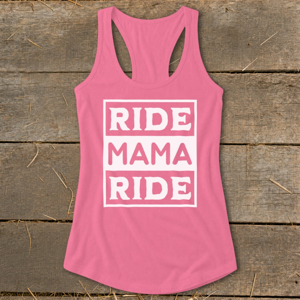 Pink racerback tank top with white "RIDE MAMA RIDE" text in three stacked boxes.