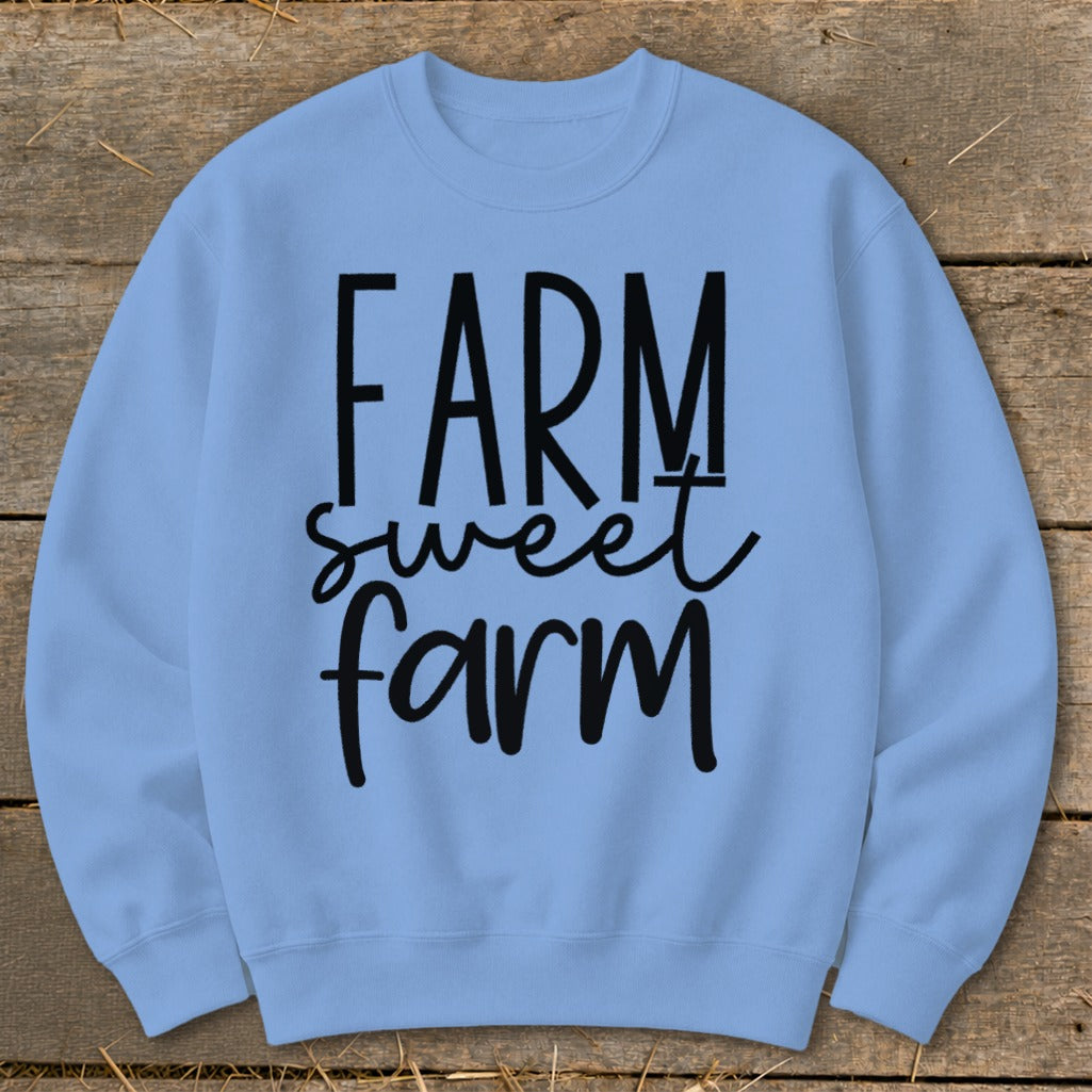 Light blue sweatshirt with black text reading "FARM sweet farm".