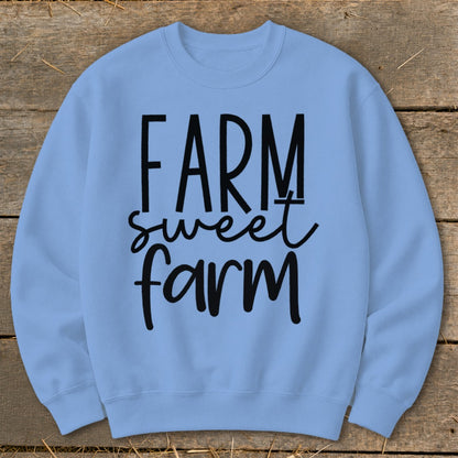 Light blue sweatshirt with black text reading "FARM sweet farm".
