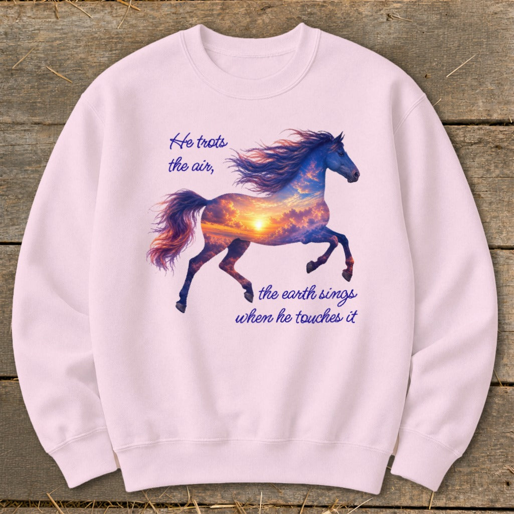 Light pink crewneck sweatshirt featuring a graphic of a running horse filled with a sunset sky and text.