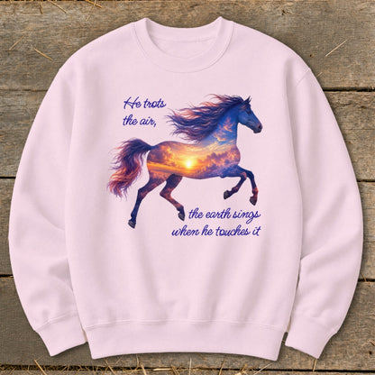Light pink crewneck sweatshirt featuring a graphic of a running horse filled with a sunset sky and text.