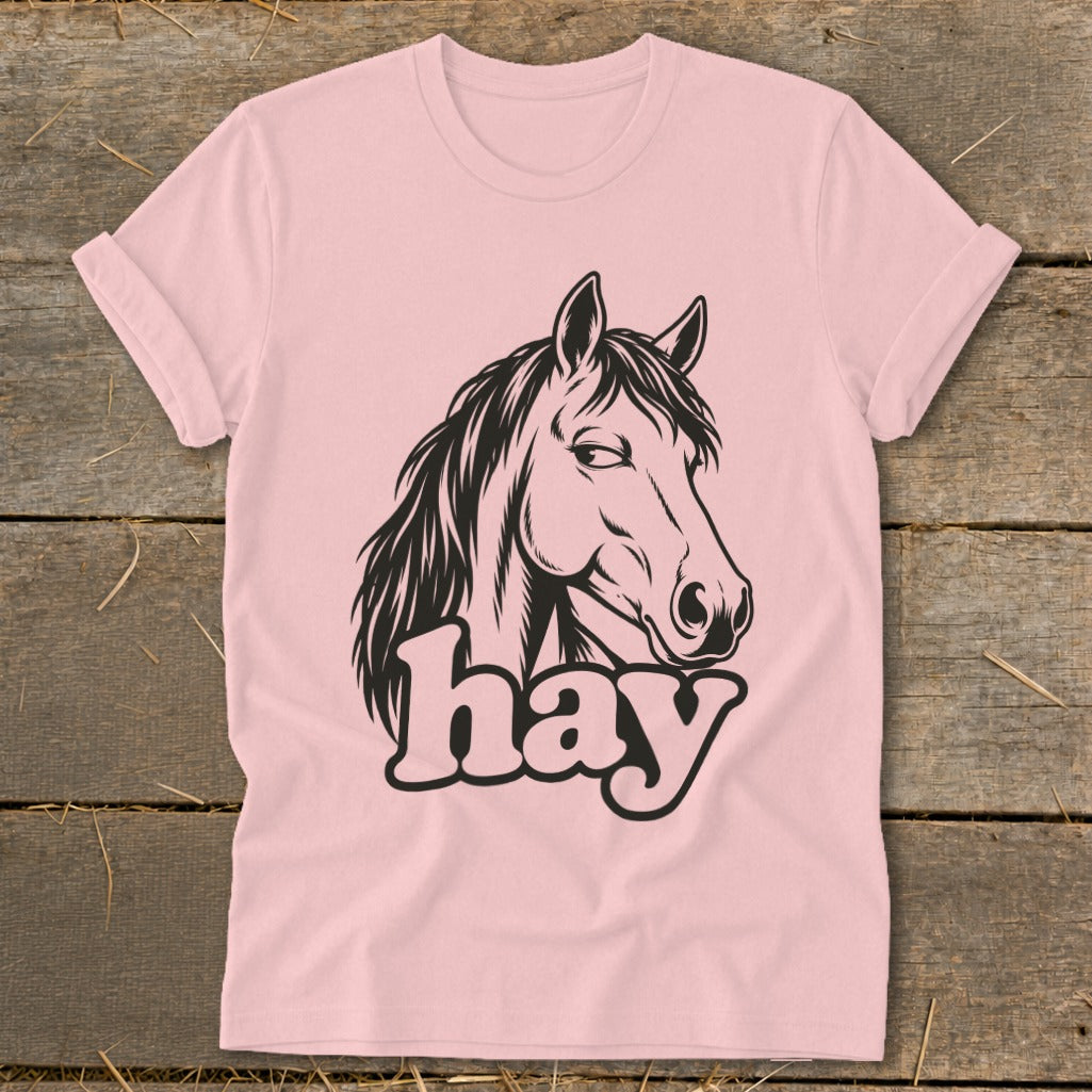 Pink t-shirt with black illustration of horse head and the word "hay".