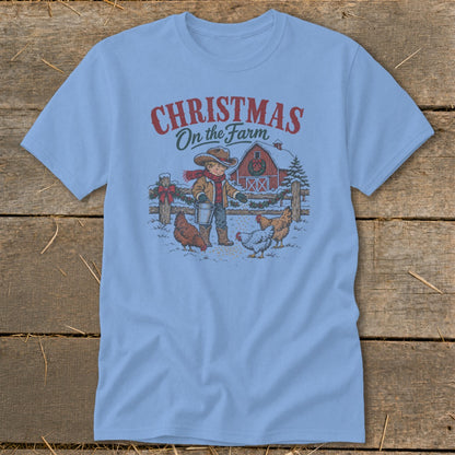 Christmas on the Farm text above boy feeding chickens outside snowy barn.