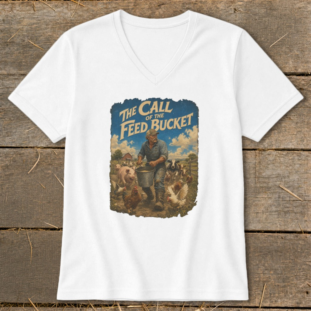 "The Call of the Feed Bucket" graphic with farmer feeding animals on a t-shirt.