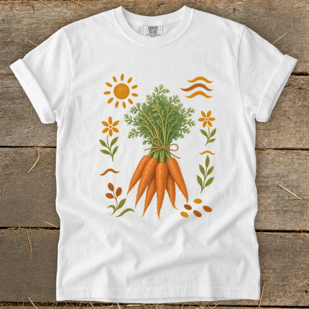 White t-shirt with a graphic of a bunch of carrots, sun, and flowers.