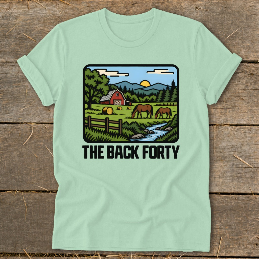 A light green t-shirt displays a graphic of a farm scene with horses, a barn, and the text THE BACK FORTY.