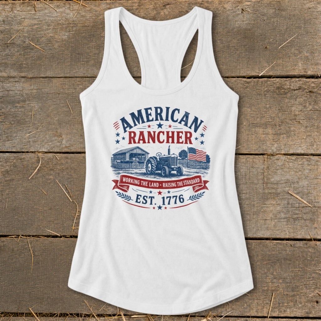 White tank top with "American Rancher Est. 1776" graphic featuring a tractor and barn.