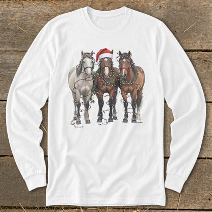 Three horses with Christmas lights and Santa hat on a white long-sleeve shirt.