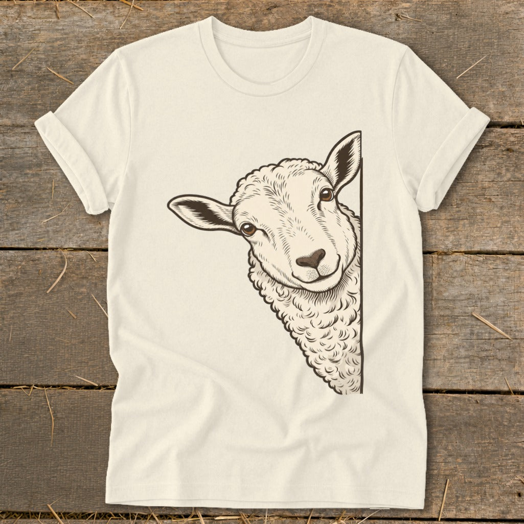 Cream t-shirt with a sketch of a sheep peeking from the side.