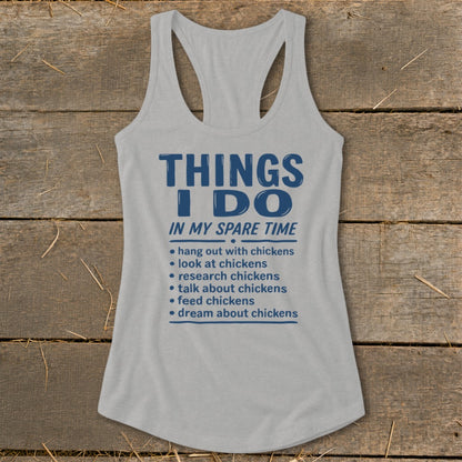 Grey tank top with blue text about chicken-related activities.
