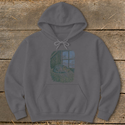 Gray hoodie with a printed design of a cat sleeping on hay by a window.