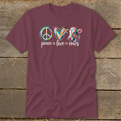 Maroon t-shirt with "Peace Love Cows" text and colorful peace, heart, and cow graphic.