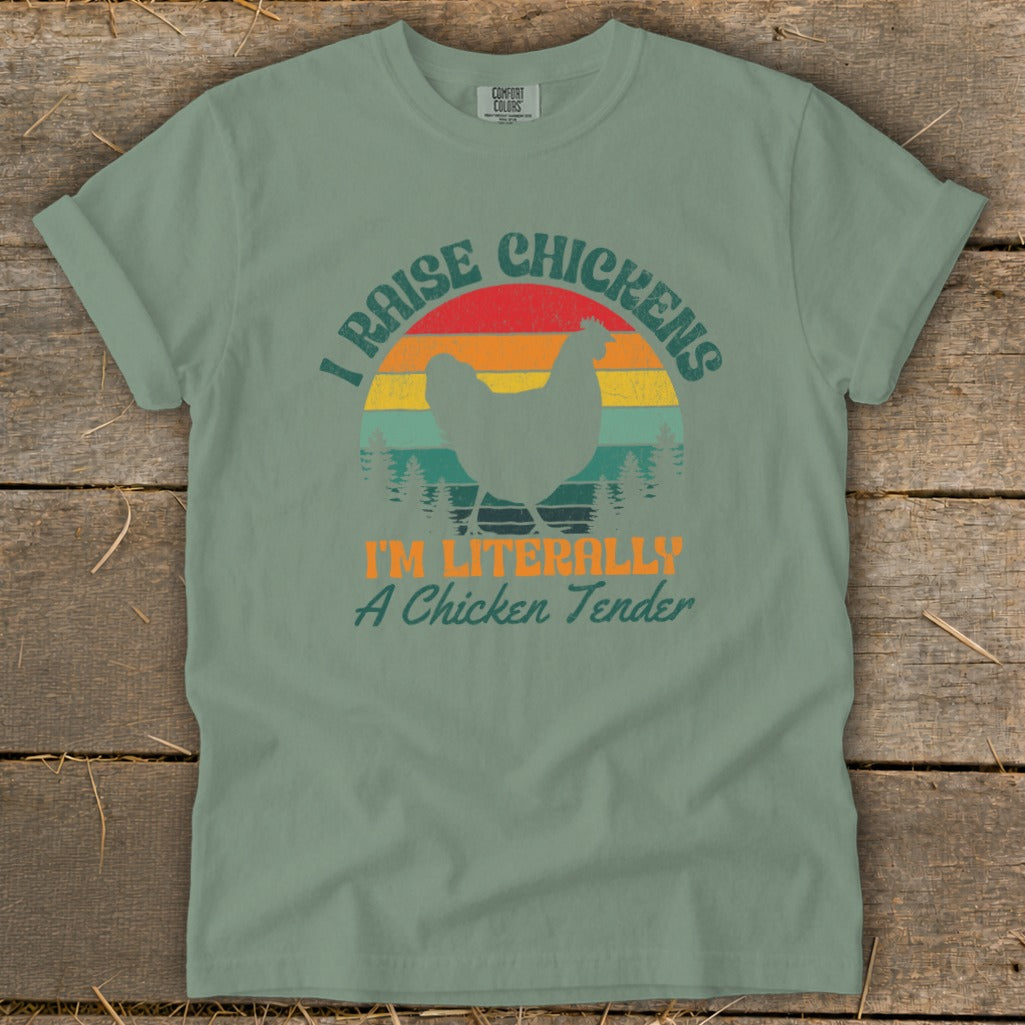 Green t-shirt with retro graphic: "I Raise Chickens" and "I'm Literally A Chicken Tender".