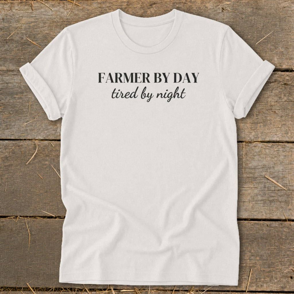 White t-shirt with text "FARMER BY DAY tired by night"