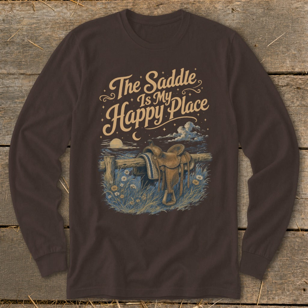 Brown long-sleeve shirt with "The Saddle Is My Happy Place" text and saddle graphic.