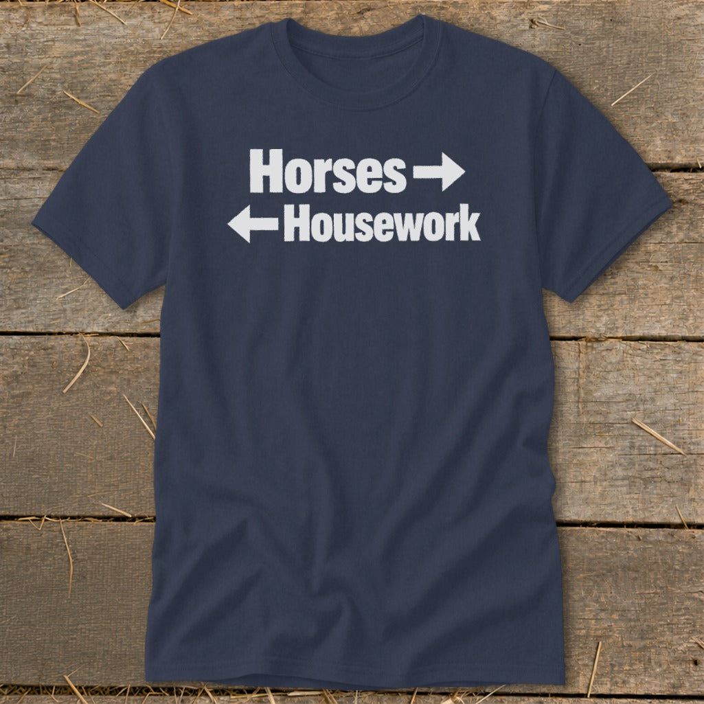 Dark blue crewneck t-shirt with white text reading "Horses" pointing right and "Housework" pointing left.