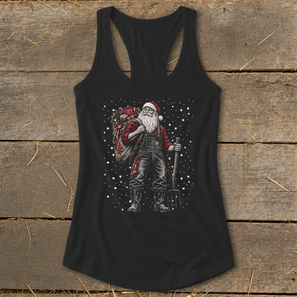 Farmer Santa carrying a sack of gifts and holding a pitchfork.