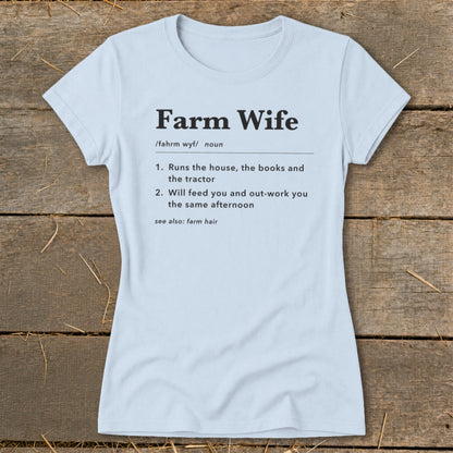 Light blue t-shirt with "Farm Wife" definition: "Runs the house, the books and the tractor" and "Will feed you and out-work you the same afternoon."