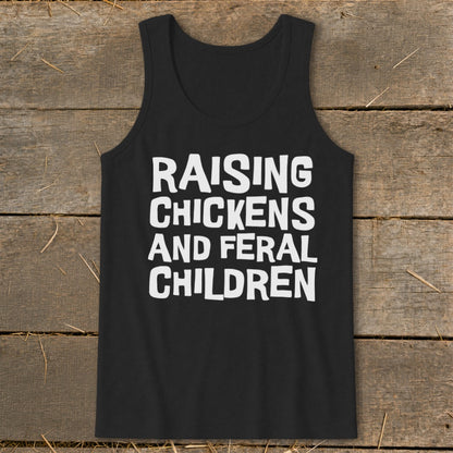 Black tank top with white text reading "Raising Chickens and Feral Children".