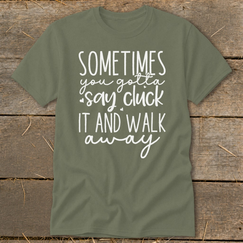 Olive green t-shirt with white text: "Sometimes you gotta say cluck it and walk away."