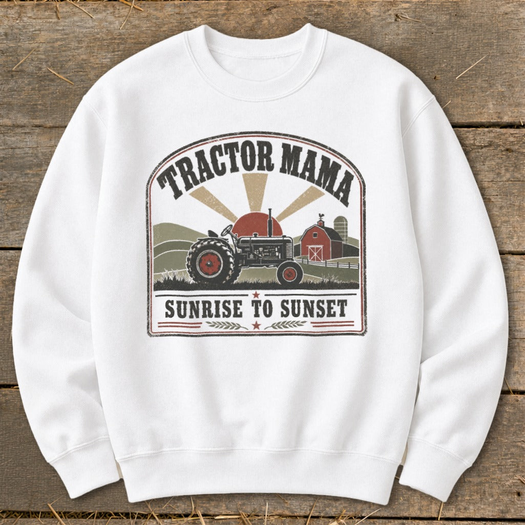 White sweatshirt with "Tractor Mama Sunrise to Sunset" graphic featuring a tractor and barn.