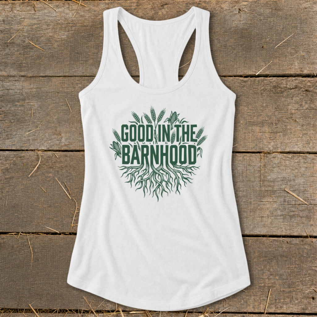 White tank top with green text and graphics reading "Good in the Barnhood".