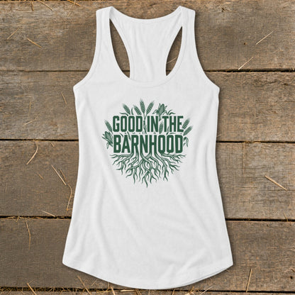 White tank top with green text and graphics reading "Good in the Barnhood".