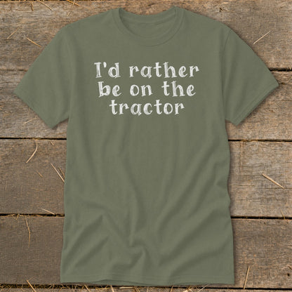 Olive green t-shirt with white text that reads "I'd rather be on the tractor".