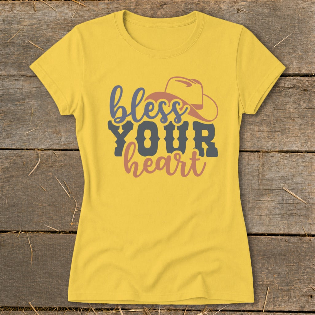 Yellow t-shirt with "bless YOUR heart" text and cowboy hat graphic.