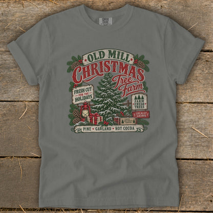 Old Mill Christmas Tree Farm graphic with pine, gifts, lantern, and festive text.