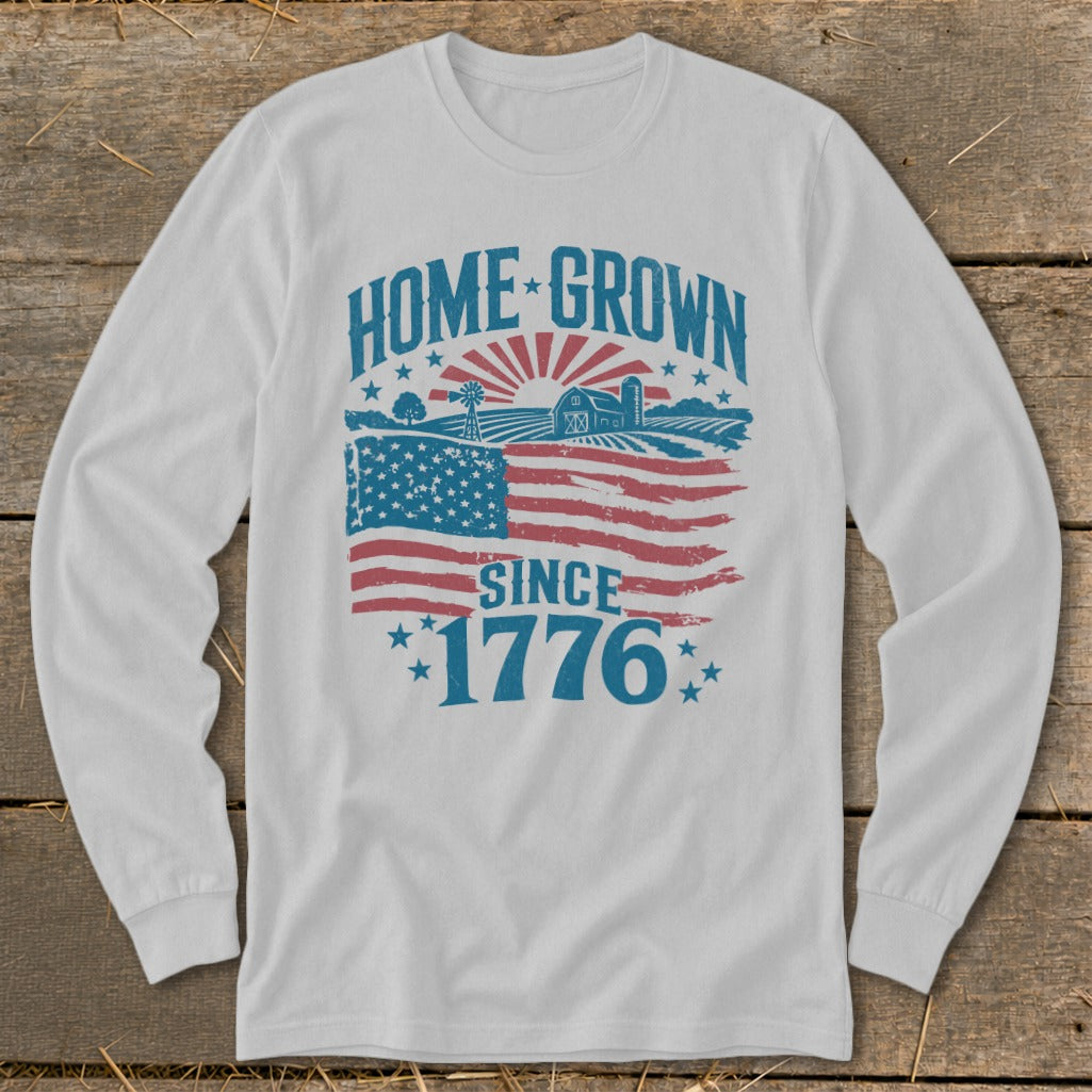 White long-sleeve shirt with "Home Grown Since 1776" text and American flag design.