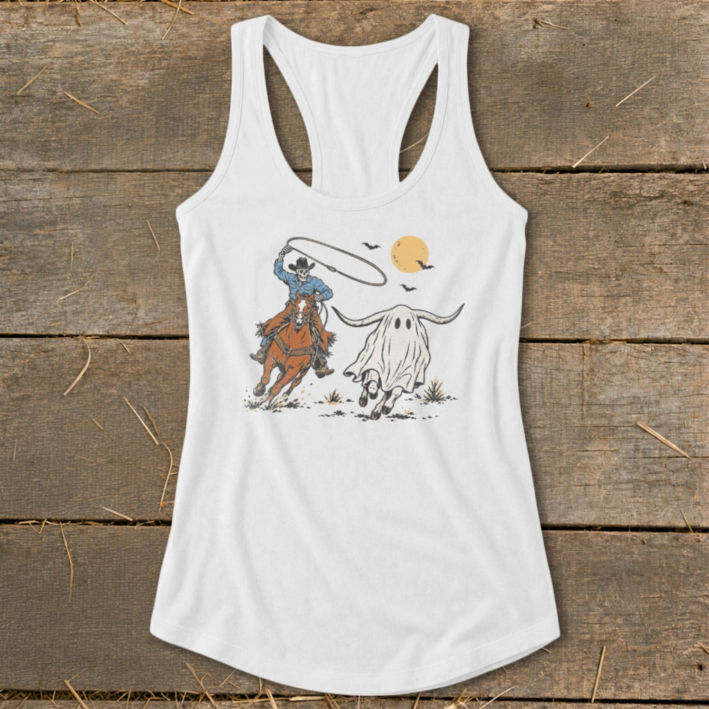 Skeleton cowboy on horse lassoing a ghost longhorn under a full moon.