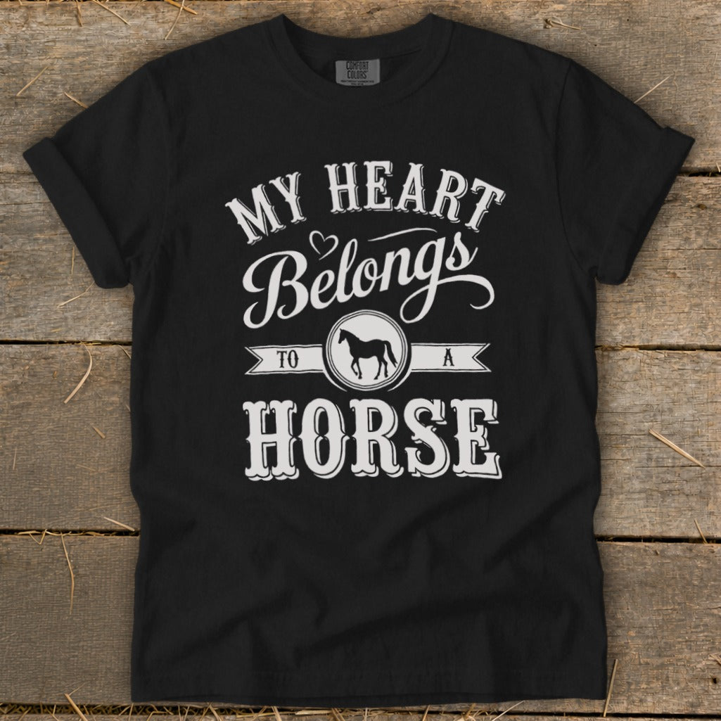 Black t-shirt with "My Heart Belongs To A Horse" text and horse silhouette.