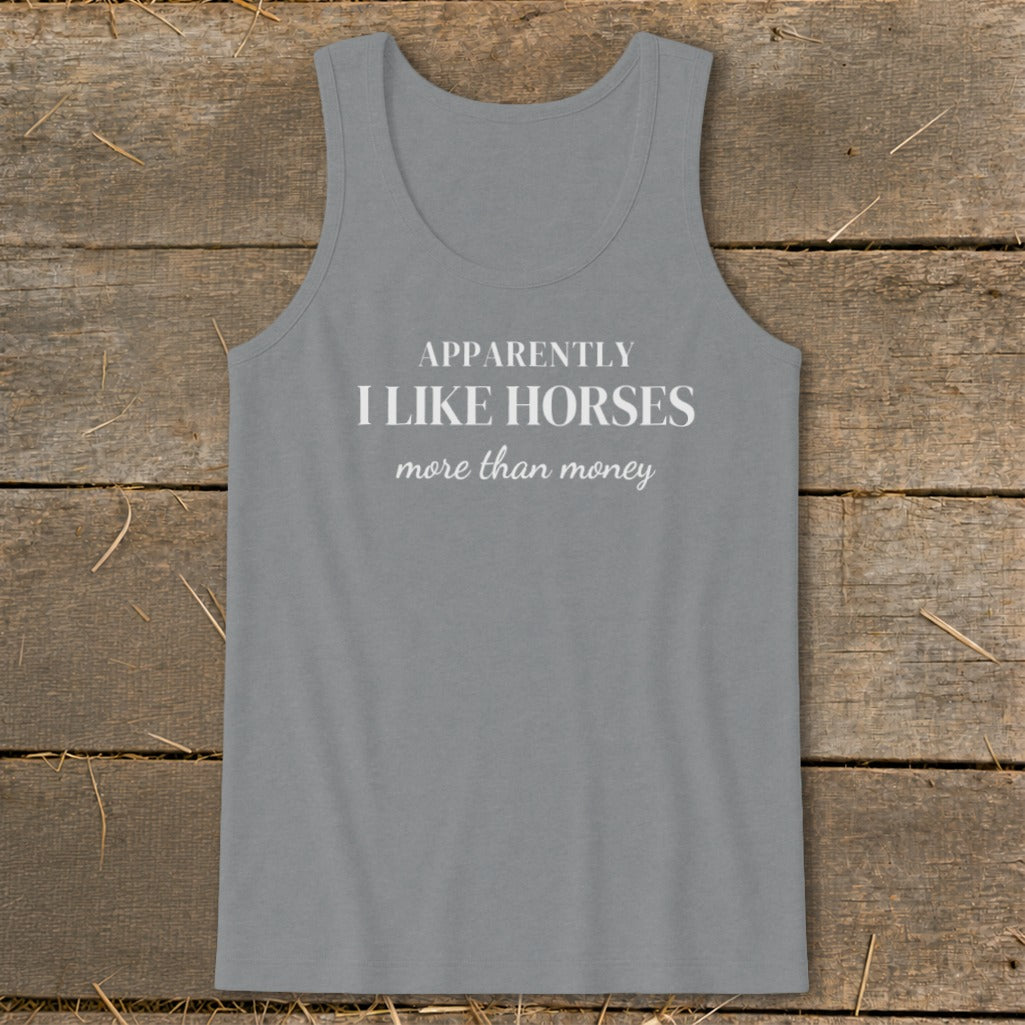 Grey tank top with white text that reads "APPARENTLY I LIKE HORSES more than money".