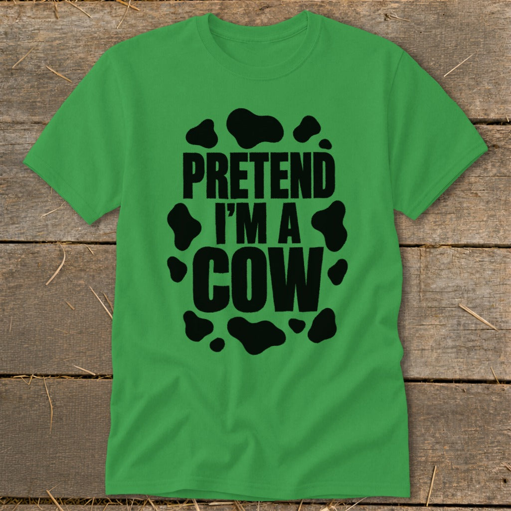 Green t-shirt with black text "PRETEND I'M A COW" and cow spots.