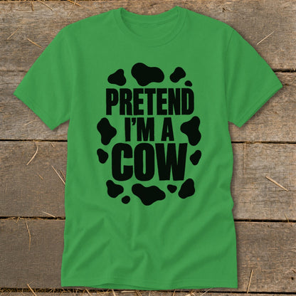Green t-shirt with black text "PRETEND I'M A COW" and cow spots.