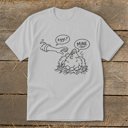 Line drawing of a hen protecting eggs with "MINE" speech bubble.