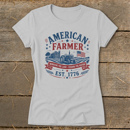 American Farmer t-shirt with tractor, barn, American flag, and "Est. 1776".