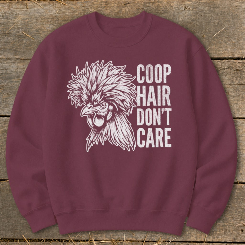 Maroon sweatshirt with white graphic of a crested chicken and text "COOP HAIR DON'T CARE".