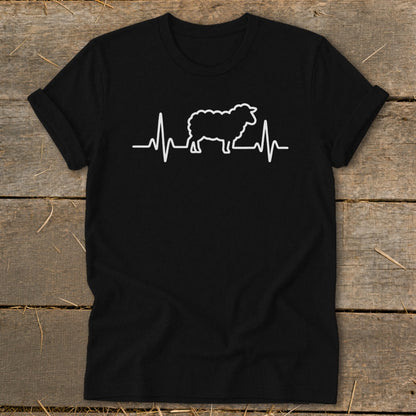 Black short-sleeved t-shirt featuring a white graphic of a sheep integrated into a heartbeat line.