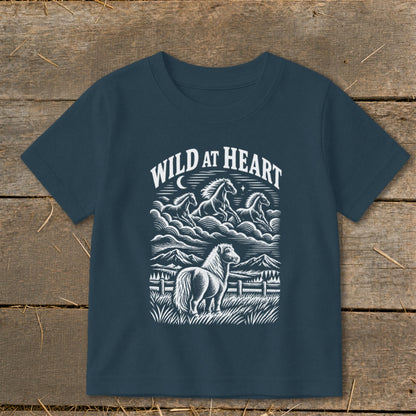 Navy t-shirt with "Wild at Heart" and a graphic of horses running in clouds over mountains.