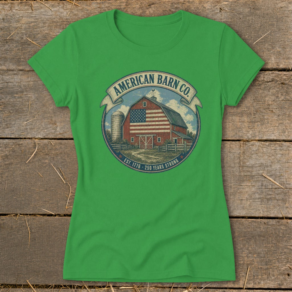Green t-shirt with circular graphic of a barn with American flag, silo, and text.